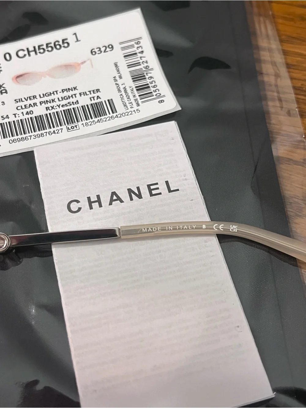 CHANEL Translucent Pale Pink Oval Sunglasses